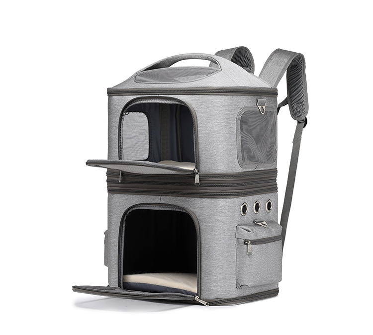 Grey dual compartment pet backpack with both upper and lower entry doors open showing fleece-lined interiors