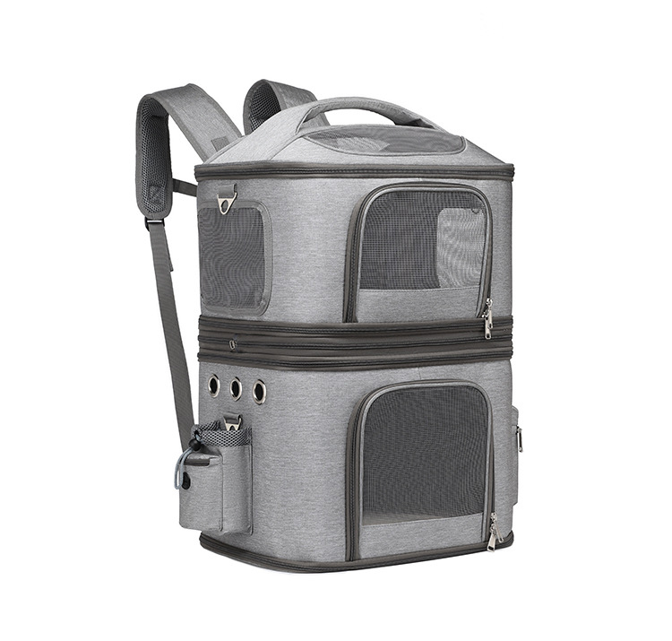 Heather grey two-tier cat travel backpack angled front-left view with side pocket and ventilation grommets