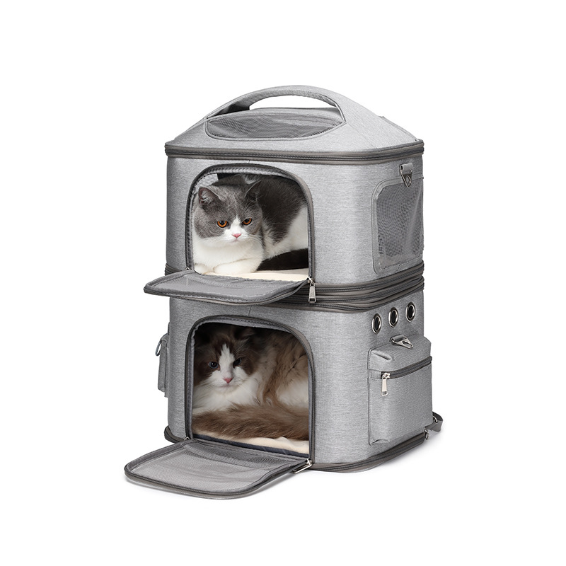 Top Sound double cat carrier backpack with two cats sitting comfortably inside the upper and lower separated compartments.