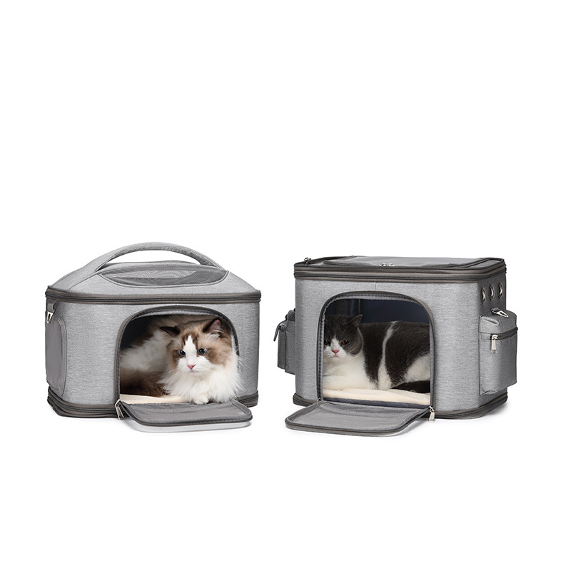 Detachable dual pet carrier bag unzipped into two individual portable cat carriers placed side by side.