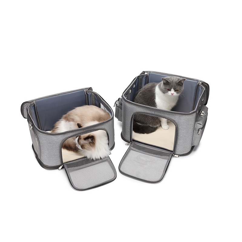 Top-opening view of separated two-tier cat travel bags showing internal plush lining pads and secure interior volume.